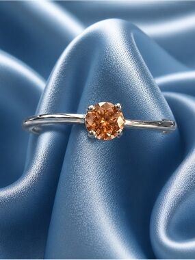 AAA Champagne D-Color VVS Moissanite solitaire in wave band. Rhodium over S925.